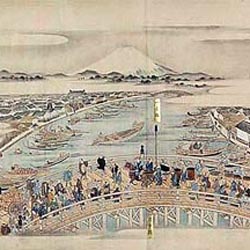 Pont Nihonbashi avec le Mont Fuji en arrière-plan issu du e-maki 絵巻, Kidai shoran 熈代勝覧, datant de 1805 et représentant les gens allant et venant sur l’avenue du Nihonbashi à l’époque. D’une longueur de 12 m © Musée des Beaux-arts asiatiques de Berlin, Museum für Asiatische Kunst